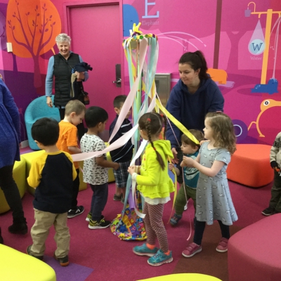 Children around maypole in Children's Room